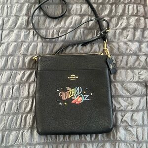Coach Black Crossbody Bag with Colorful 'Wizard of Oz' Graphic
